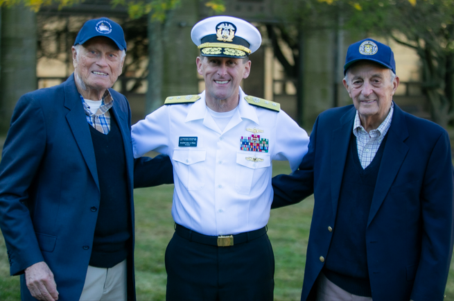 Admiral Okon and two members of class of 1959 smiling together